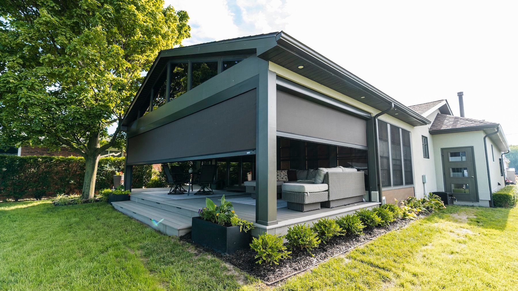 Magnatrack motorized screens on a residential deck