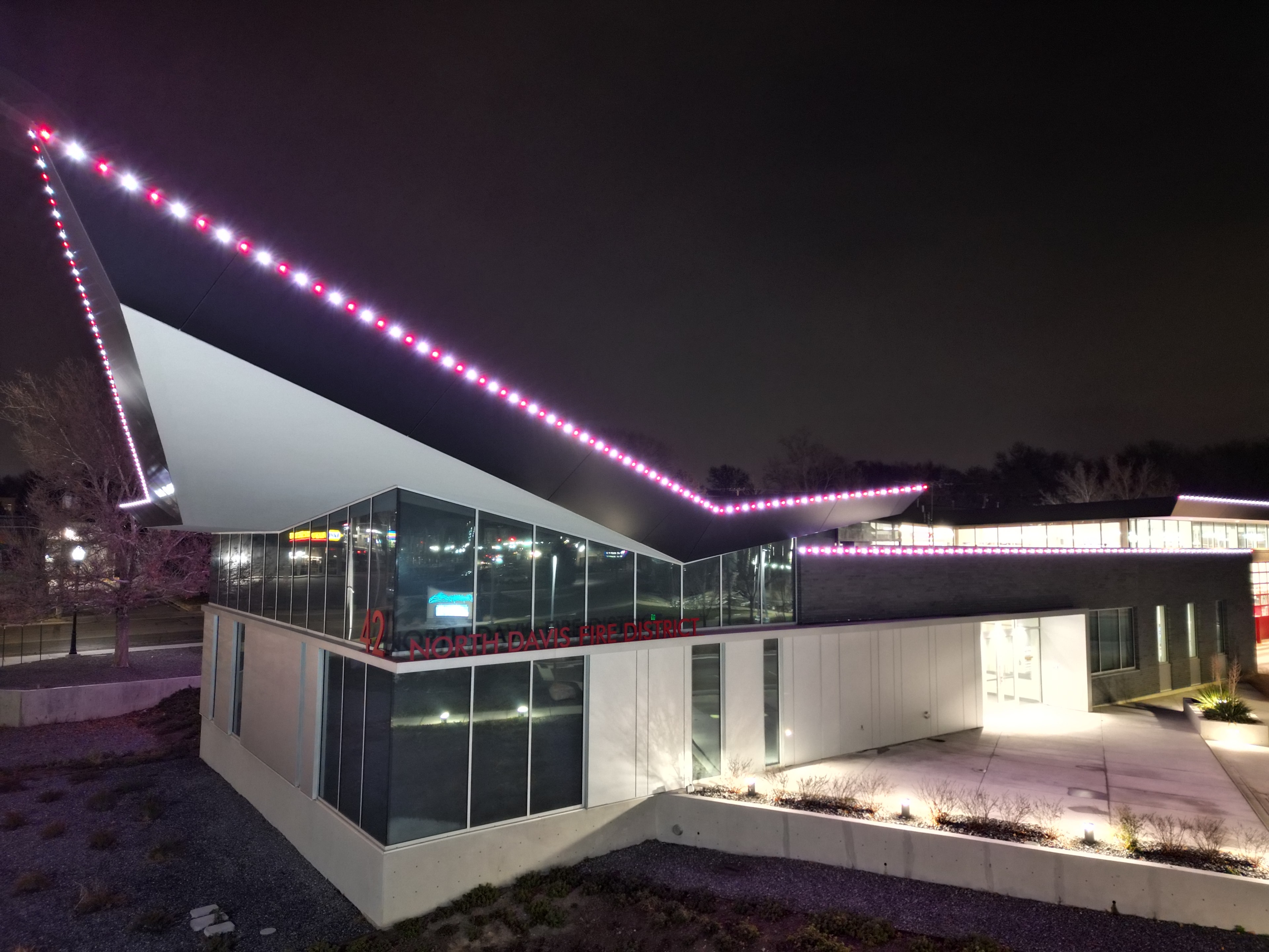 TruLight commercial lighting installation on a fire station building at night